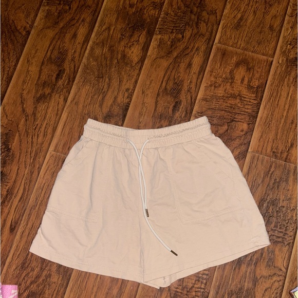 A loves a tan shorts bought from Dillards 💙 - Picture 1 of 2